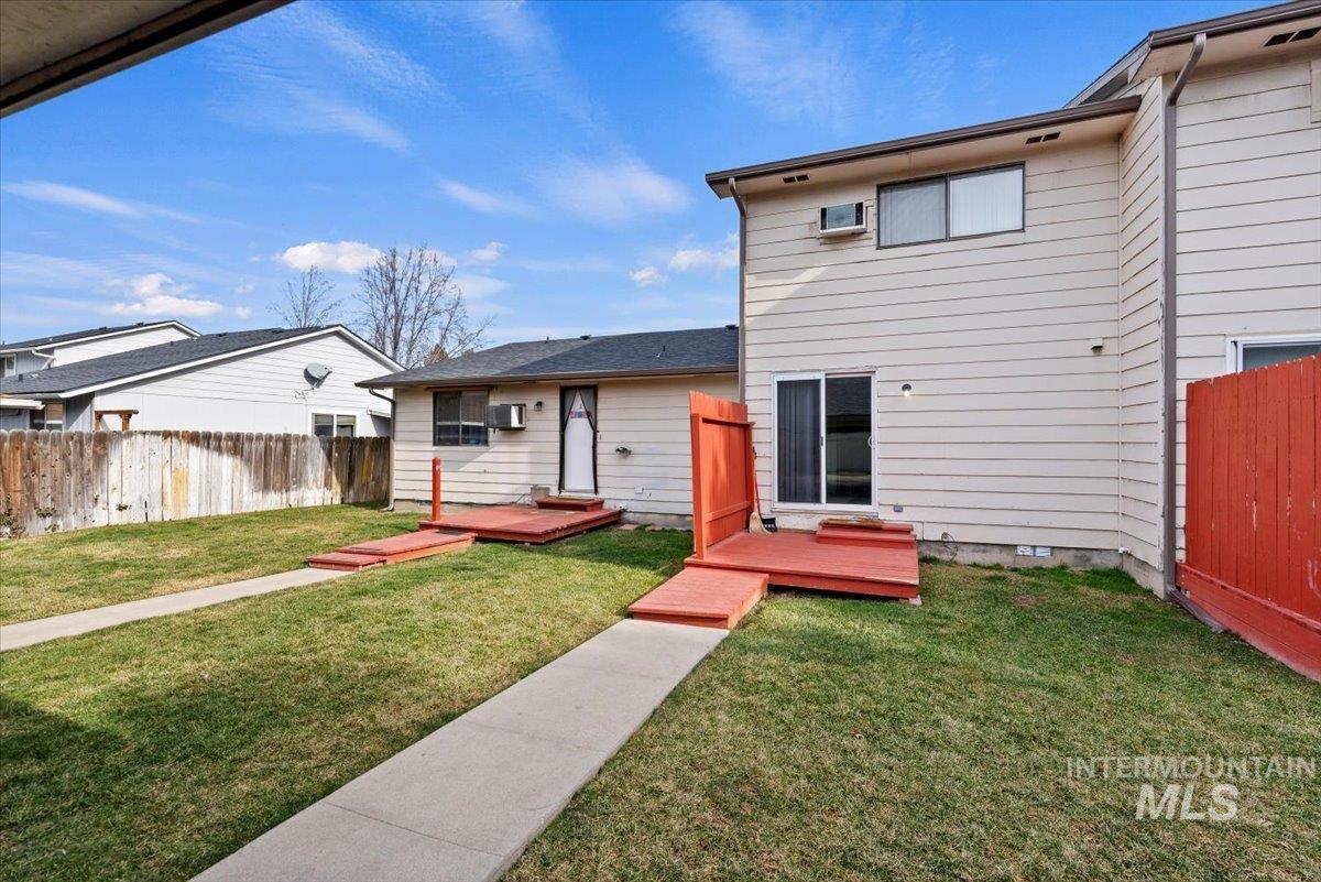 819 North Benjamin Lane Boise, ID 83704 - Photo 22 of 26 Rear view of property featuring a wooden deck