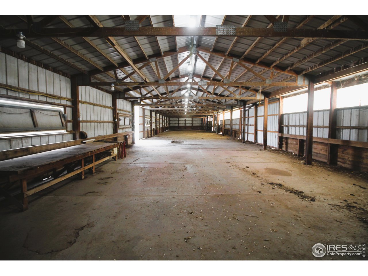 22354 County Road 41 Sterling, CO 80751 - Photo 18 of 40 a view of an empty room with wooden walls