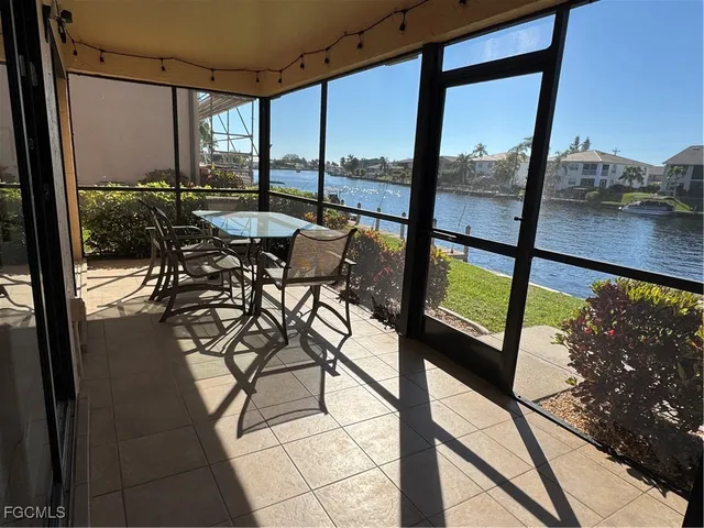 a view of a living room and dining room