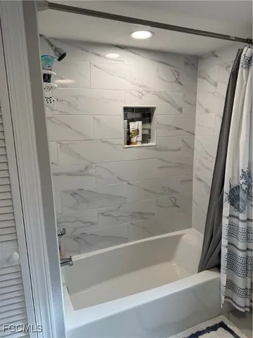 a bathroom with a bathtub