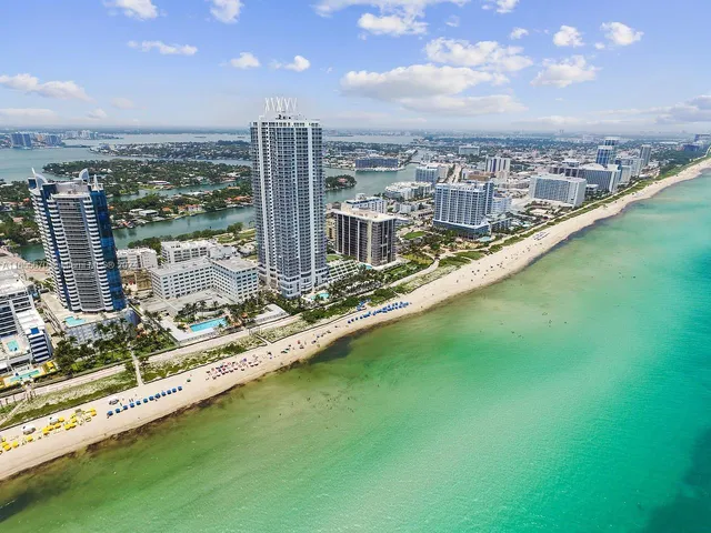a view of a city with a lake