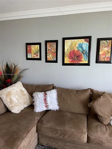 a living room with furniture and a couch