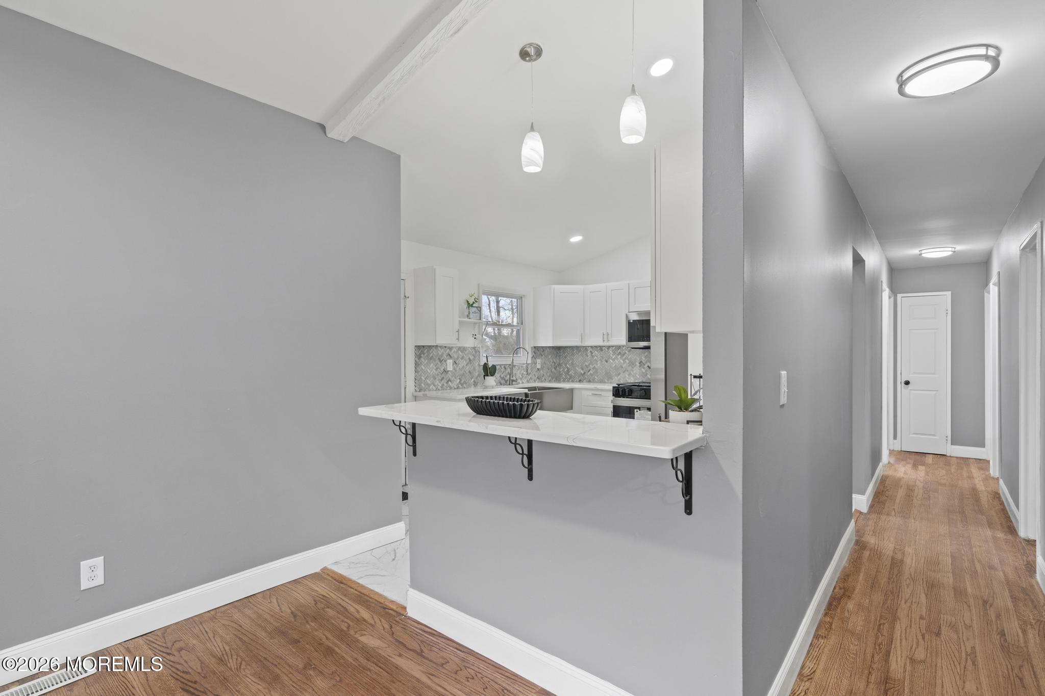 20 Kenneth Terrace Neptune Township, NJ 07753 - Photo 2 of 34 a view of a kitchen and dining room