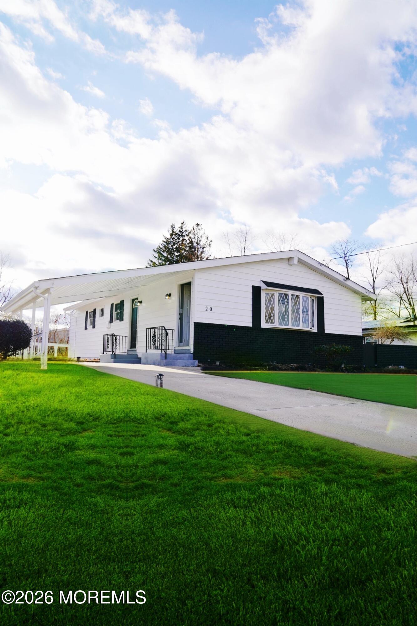 20 Kenneth Terrace Neptune Township, NJ 07753 - Photo 23 of 34 a view of a house with a big yard