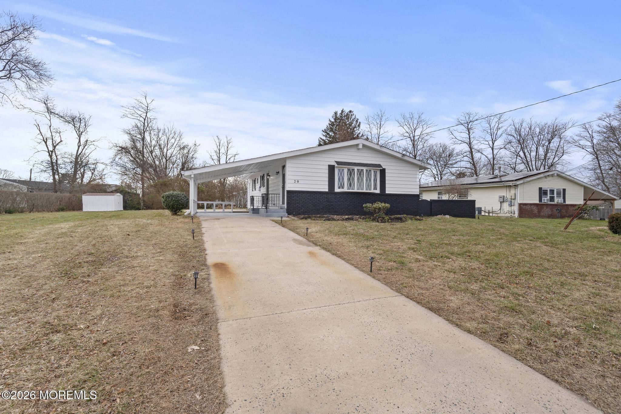 20 Kenneth Terrace Neptune Township, NJ 07753 - Photo 8 of 34 a view of a house with a yard