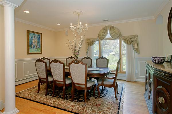 65 Indian Ridge Road Newton, MA 02459 - Photo 4 of 9 a view of a dining room with furniture