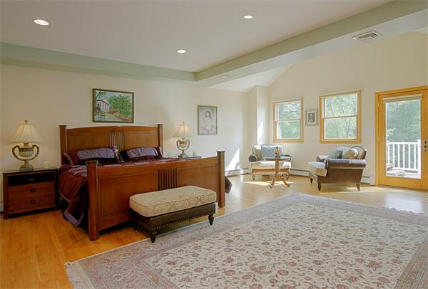 65 Indian Ridge Road Newton, MA 02459 - Photo 5 of 9 a bedroom with furniture and a couch