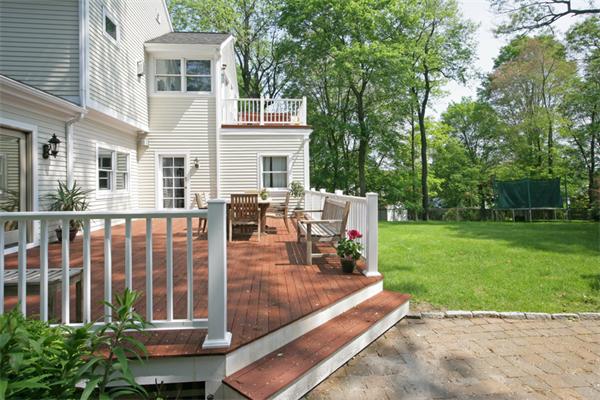 65 Indian Ridge Road Newton, MA 02459 - Photo 8 of 9 a view of a house with backyard porch and sitting area