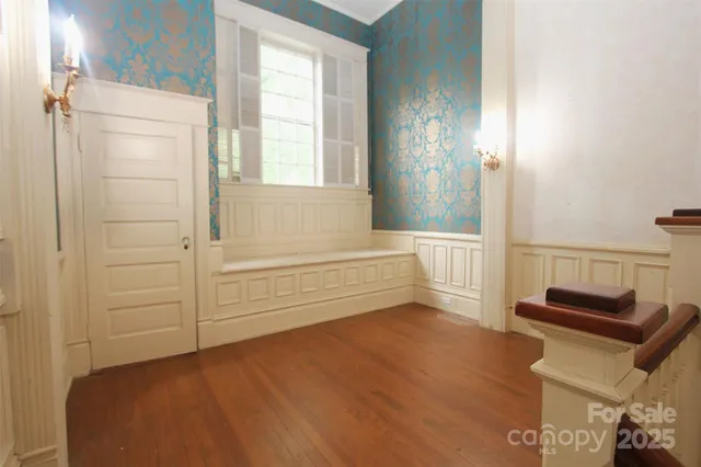 a view of small space with wooden floor