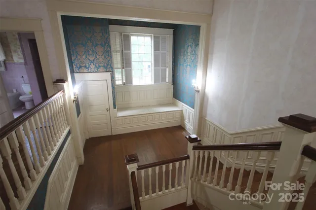 a view of entryway with wooden floor