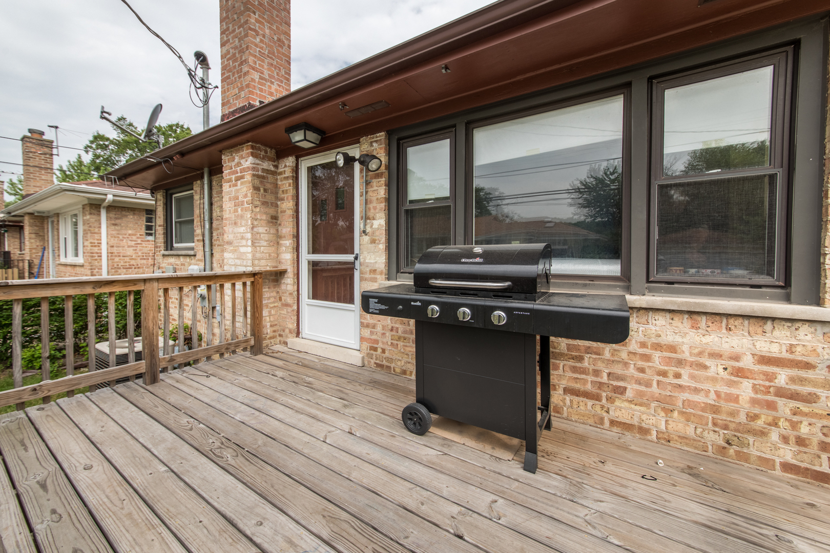3749 Main Street Skokie, IL 60076 - Photo 16 of 17 a view of a house with wooden deck