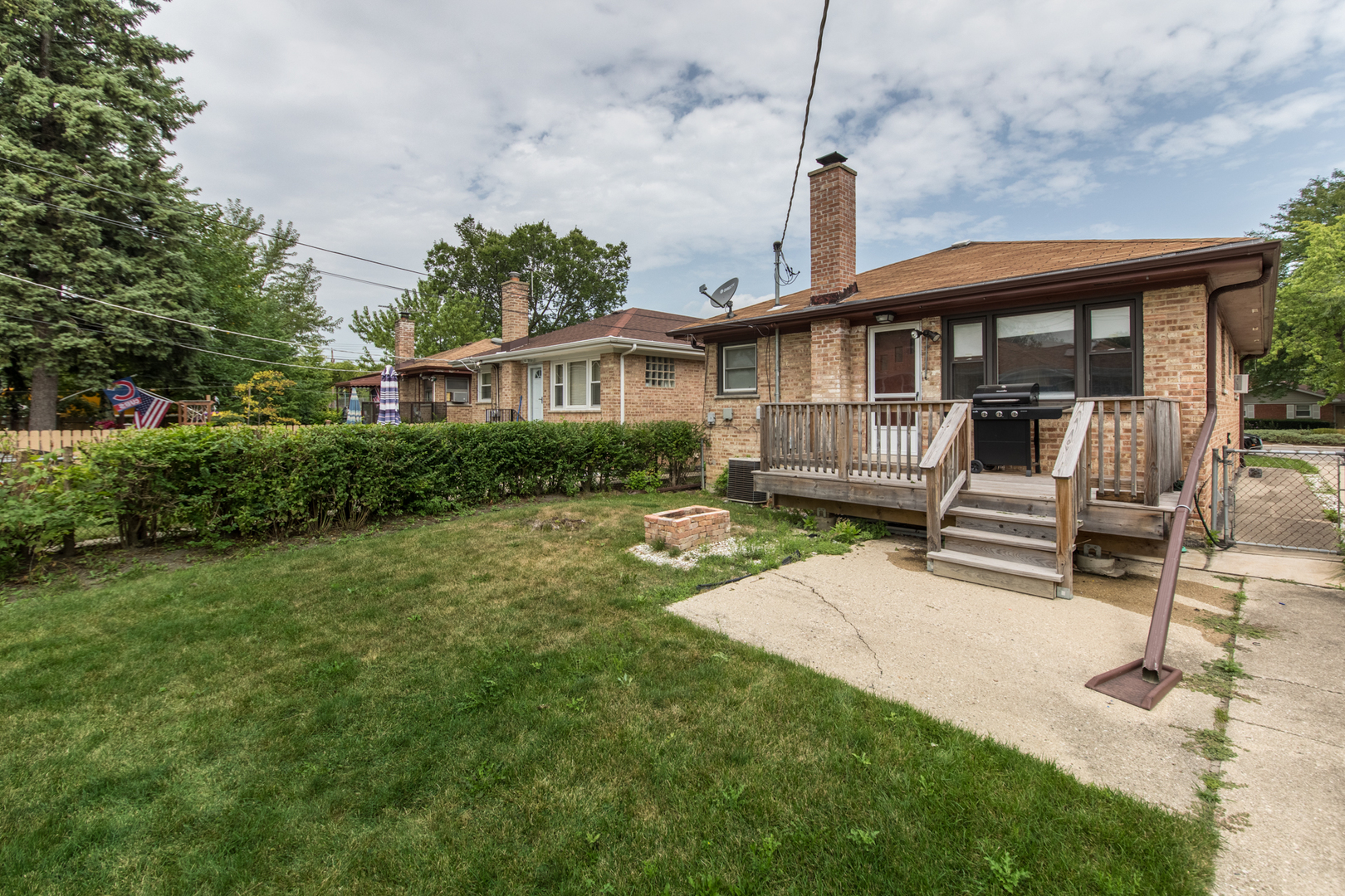 3749 Main Street Skokie, IL 60076 - Photo 17 of 17 a front view of a house with a garden