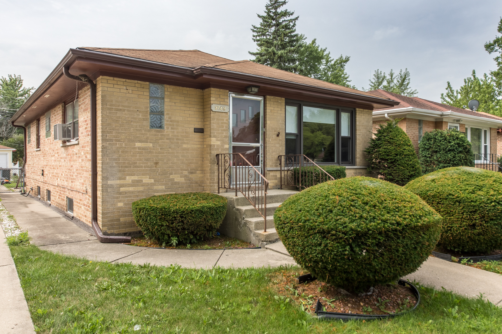 3749 Main Street Skokie, IL 60076 - Photo 2 of 17 a view of a house with backyard and sitting area