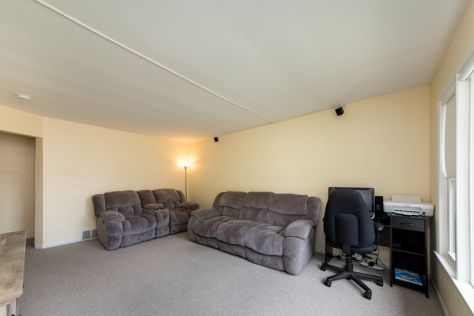 3749 Main Street Skokie, IL 60076 - Photo 4 of 17 a living room with couches and a couch