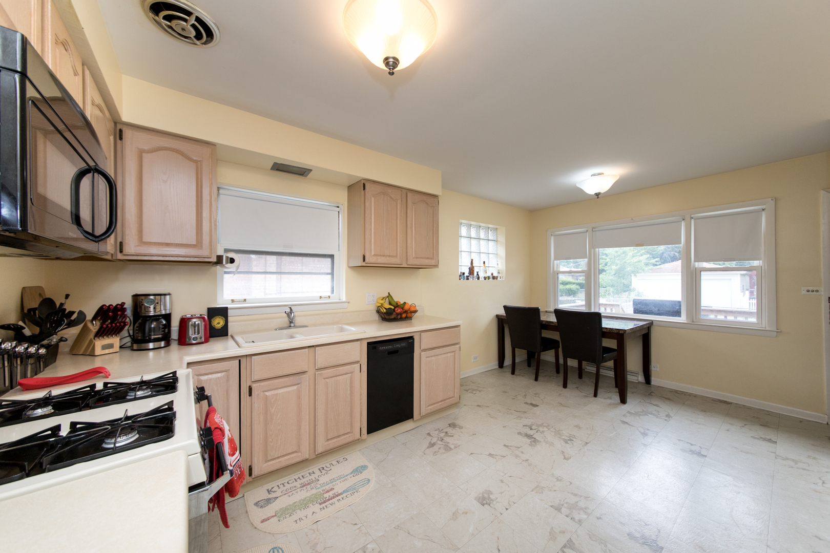 3749 Main Street Skokie, IL 60076 - Photo 5 of 17 a kitchen with lots of counter top space