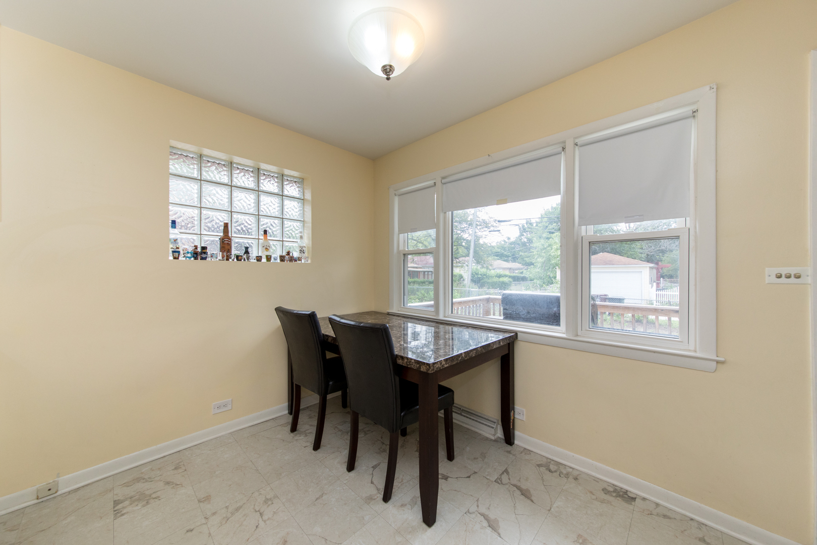 3749 Main Street Skokie, IL 60076 - Photo 8 of 17 a dining room with furniture and window
