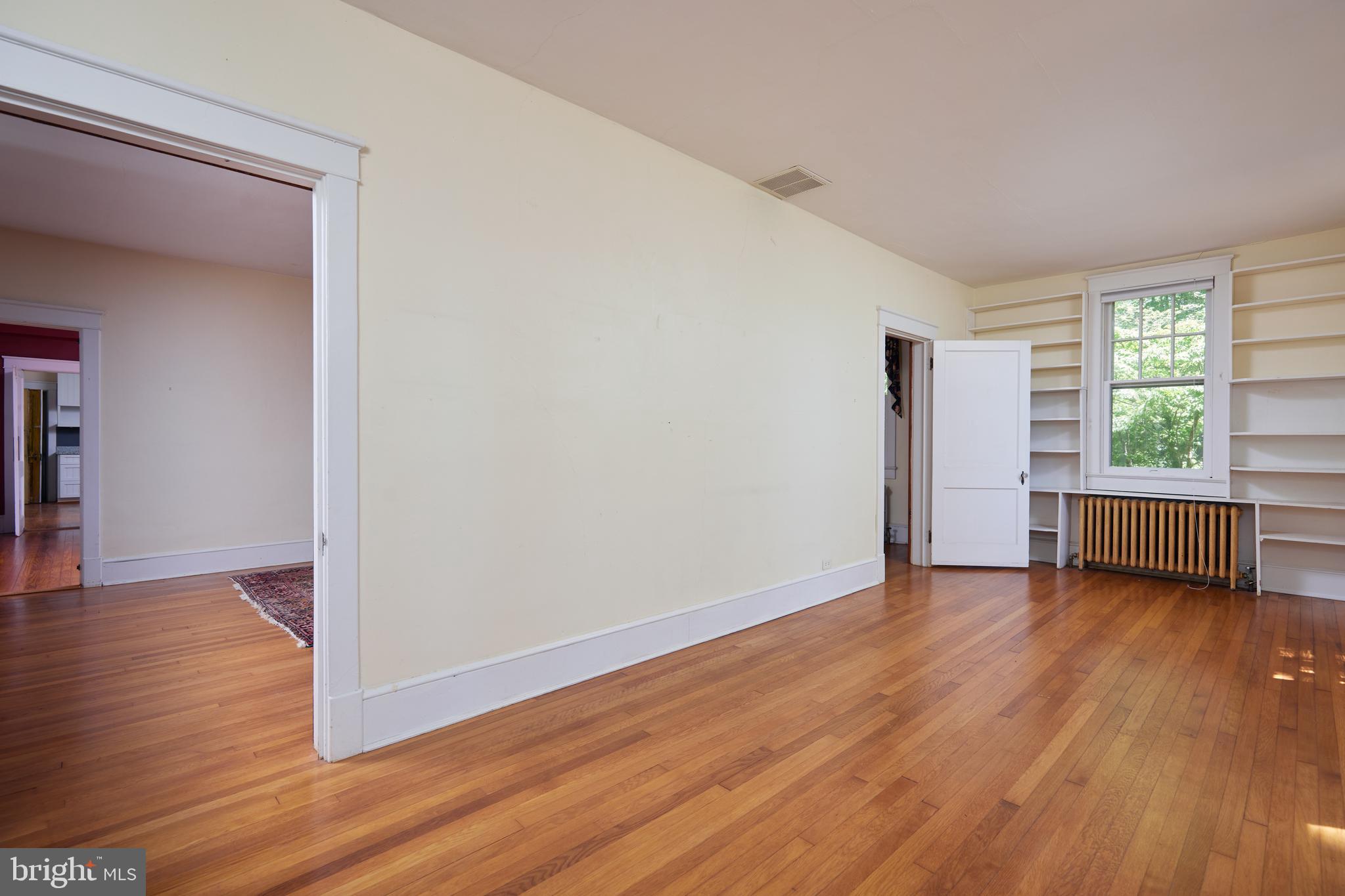 22500 Old Hundred Road Barnesville, MD 20838 - Photo 11 of 60 a view of a room with wooden floor and window