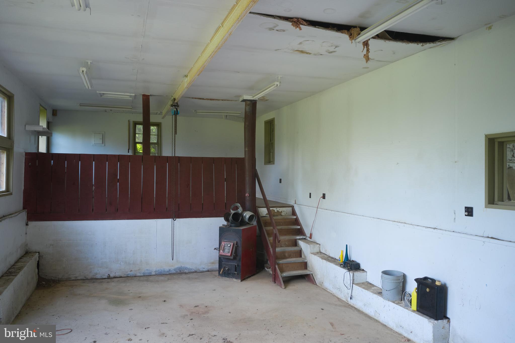 22500 Old Hundred Road Barnesville, MD 20838 - Photo 40 of 60 a view of a room with wooden walls