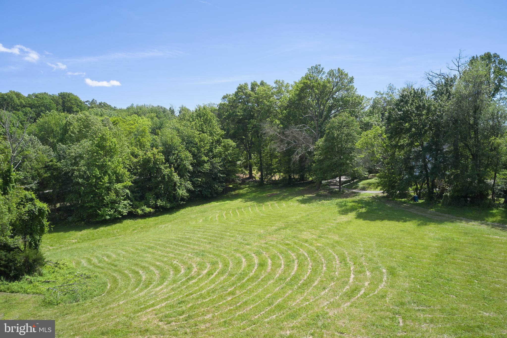22500 Old Hundred Road Barnesville, MD 20838 - Photo 41 of 60 a backyard of a house with lots of green space and mountain view