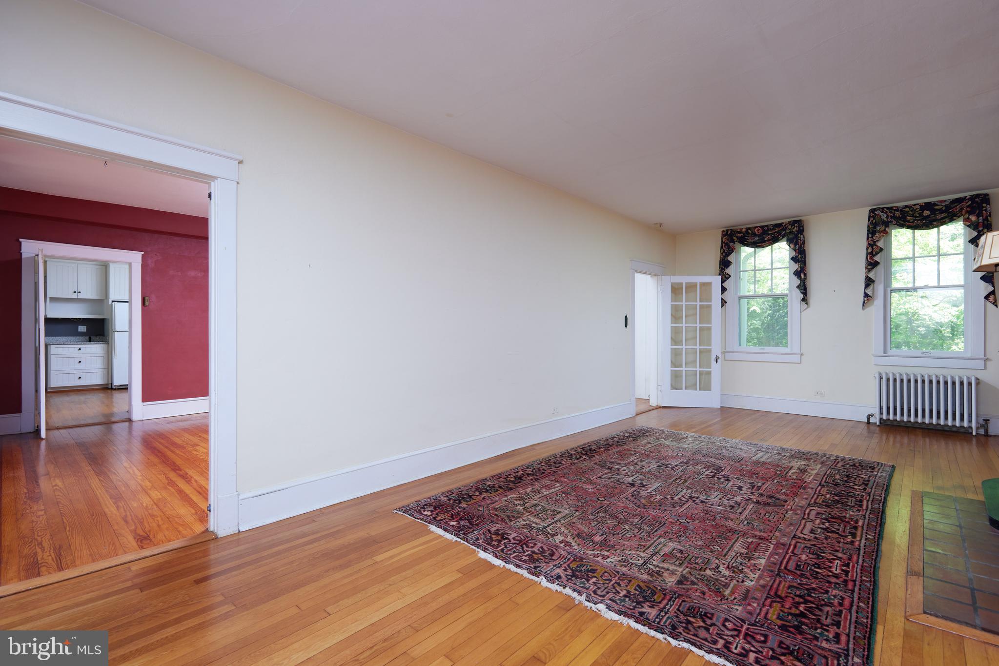 22500 Old Hundred Road Barnesville, MD 20838 - Photo 9 of 60 wooden floor in an empty room with a window
