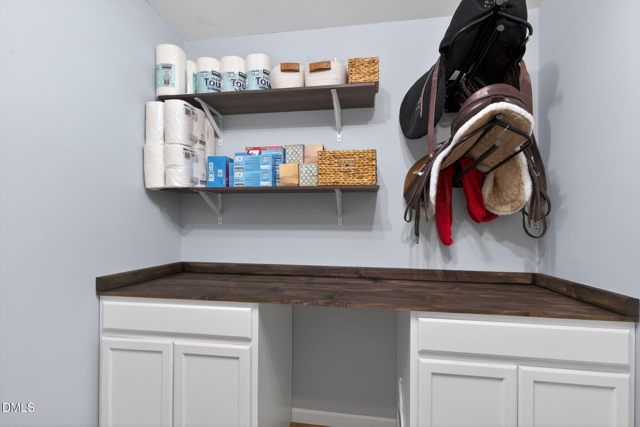 713 Marsh Grass Drive Raleigh, NC 27610 - Photo 22 of 41 a close view of shoes stand and cabinets