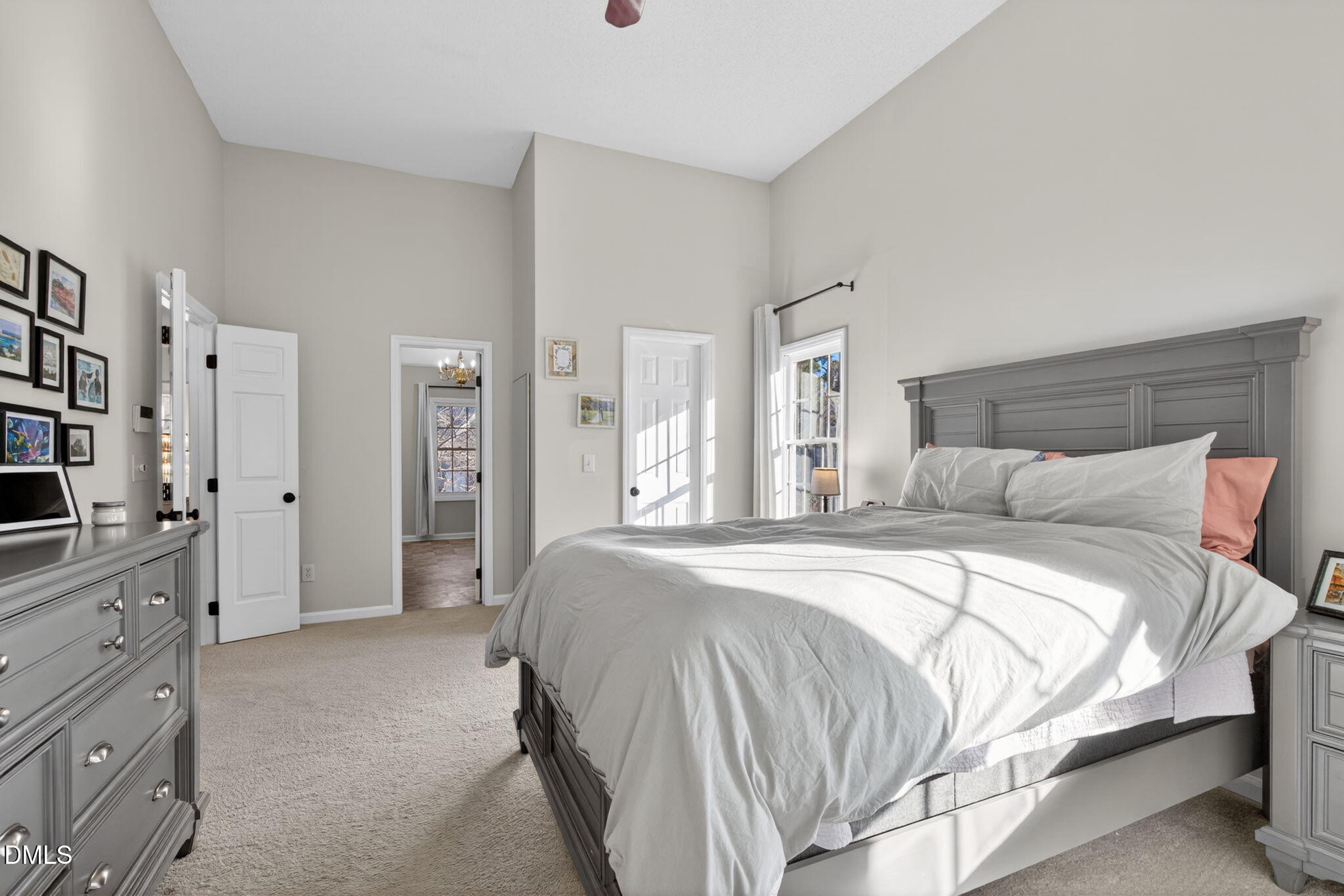 713 Marsh Grass Drive Raleigh, NC 27610 - Photo 26 of 41 a bedroom with a bed and a cabinets