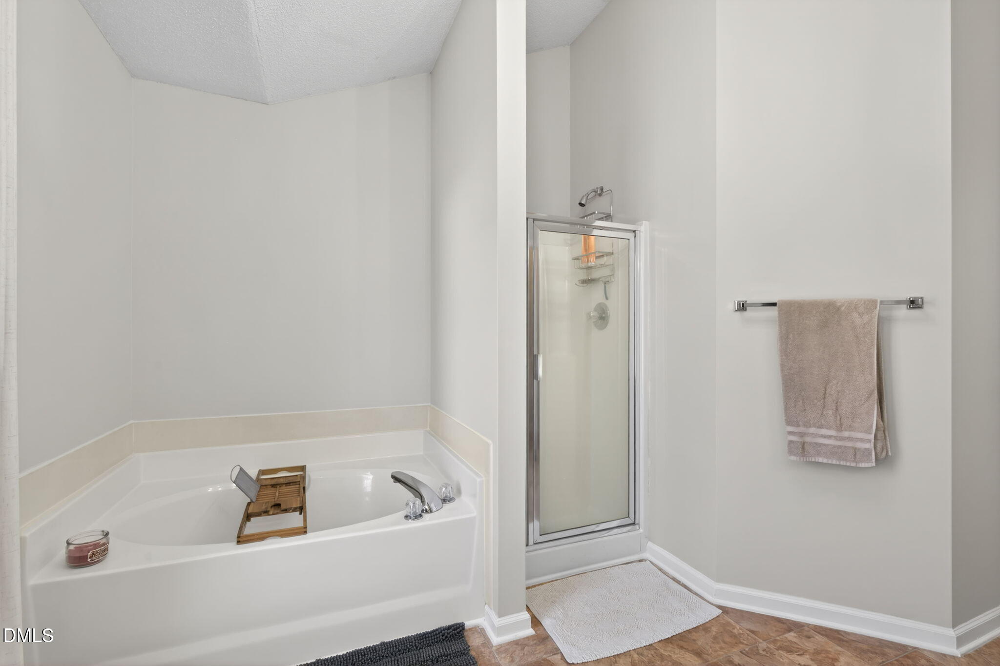 713 Marsh Grass Drive Raleigh, NC 27610 - Photo 28 of 41 a bathroom with a bathtub