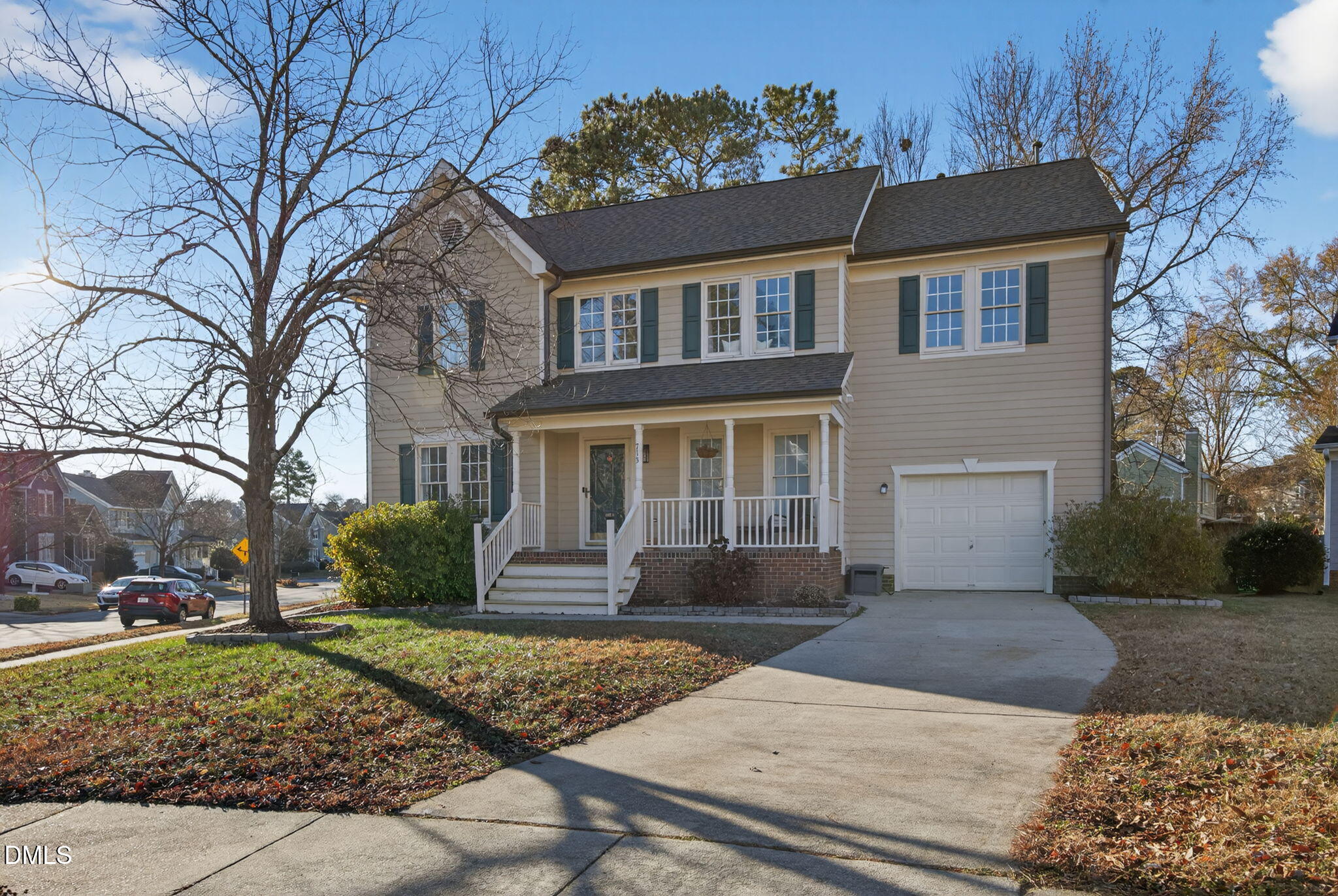 713 Marsh Grass Drive Raleigh, NC 27610 - Photo 2 of 41 a front view of a house with garden
