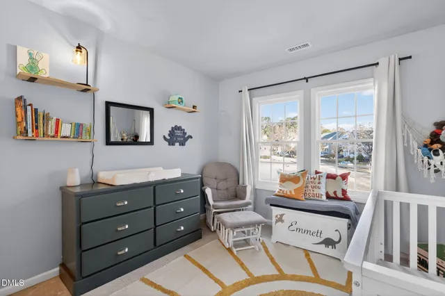 a room with a couch and a window