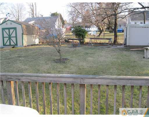153 Oxford Road Colonia, NJ 07067 - Photo 7 of 13 a view of a house with a yard