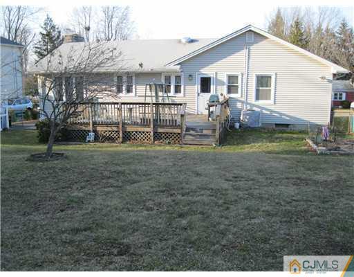 153 Oxford Road Colonia, NJ 07067 - Photo 8 of 13 a view of a house with backyard