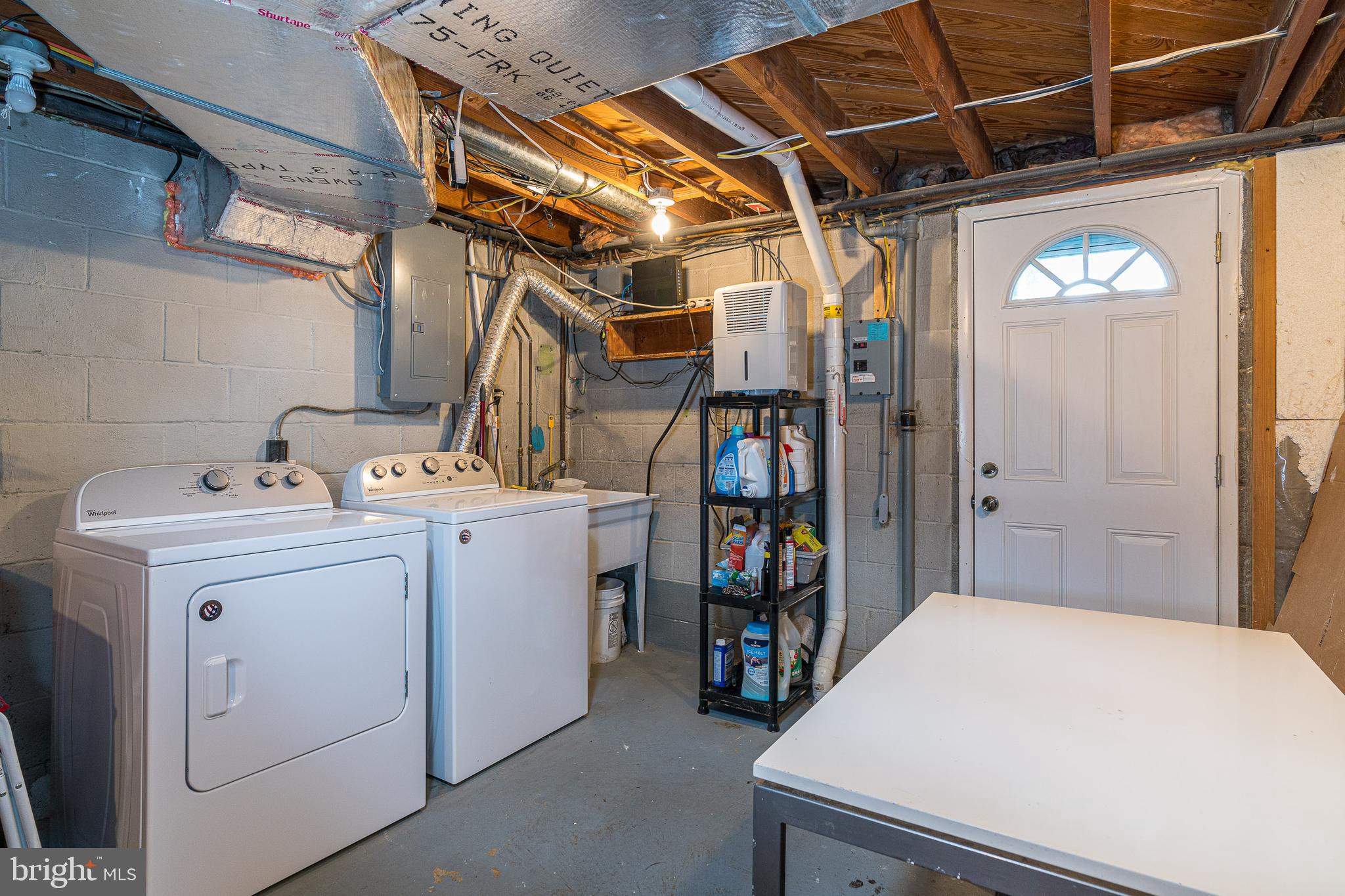 1559 Zarker Road Lancaster, PA 17601 - Photo 26 of 37 Utility and laundry with door to yard