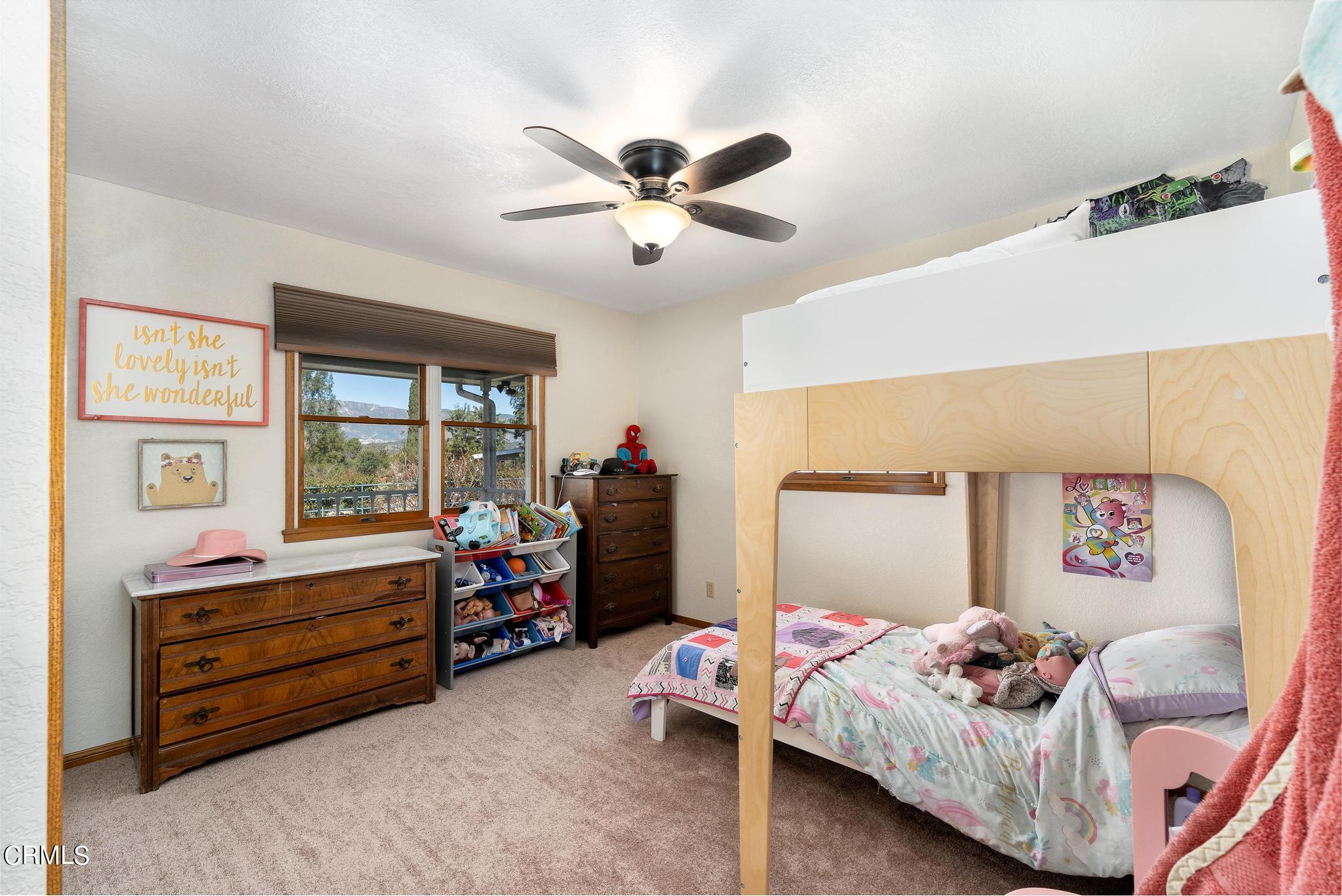 1138 Spring Street Oak View, CA 93022 - Photo 25 of 38 a bedroom with bed and a window