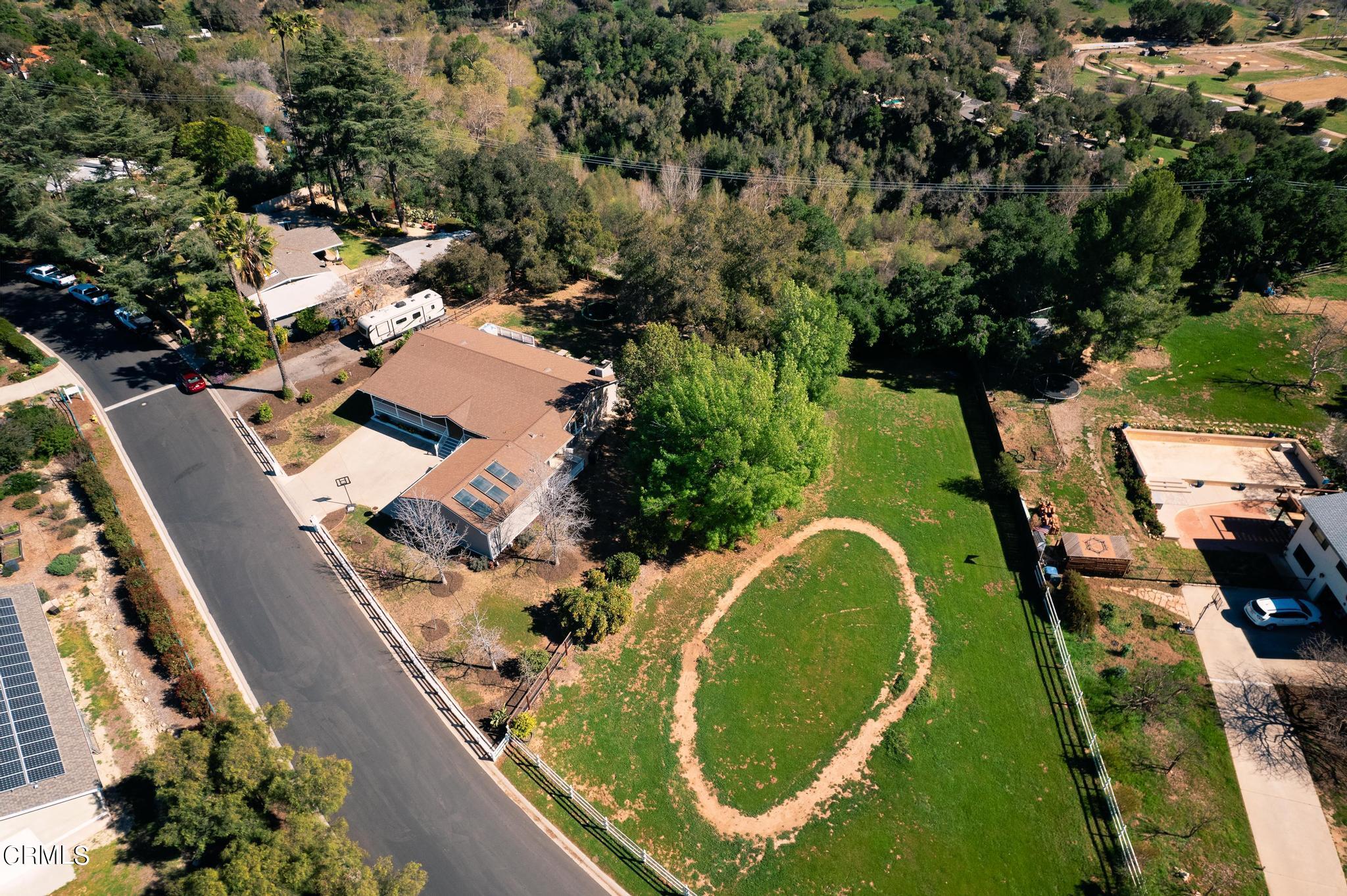 1138 Spring Street Oak View, CA 93022 - Photo 3 of 38 an aerial view of a house with a swimming pool