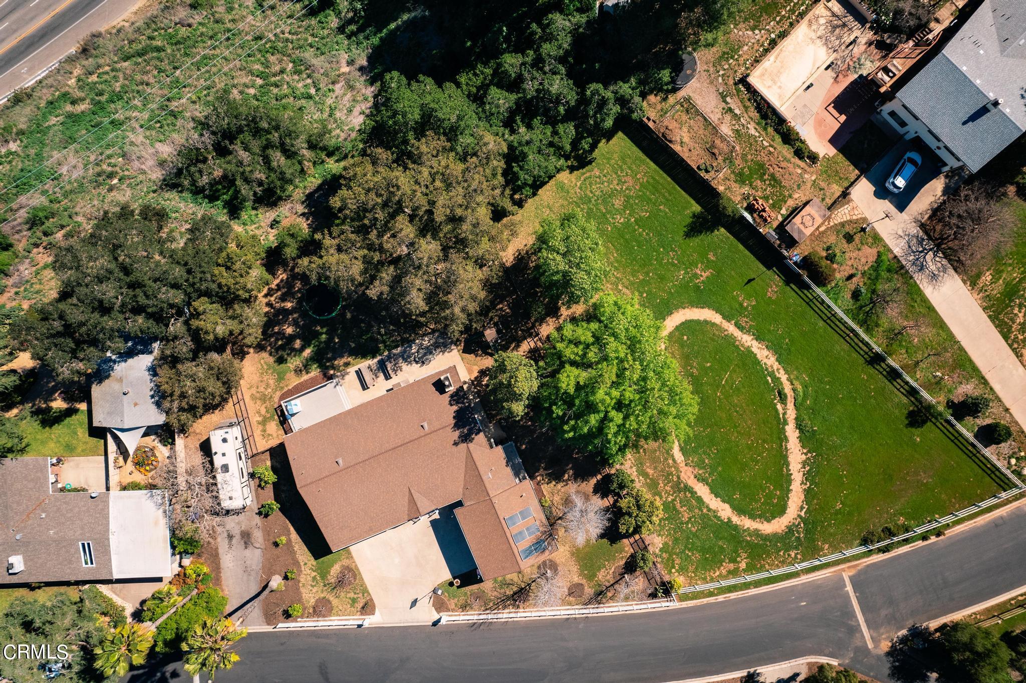 1138 Spring Street Oak View, CA 93022 - Photo 8 of 38 an aerial view of a house with a garden and swimming pool