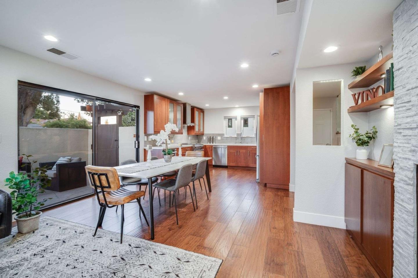 181 Centre Street, Unit 1 Mountain View, CA 94041 - Photo 13 of 58 a view of a dining room with furniture window and wooden floor