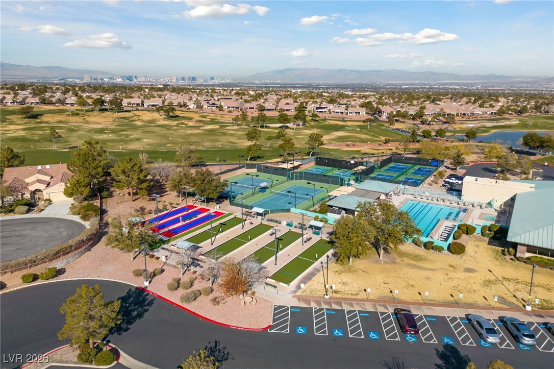 550 Kings Links Street Henderson, NV 89012 - Photo 29 of 36 Aerial view of residential area featuring a local golf course and mountains