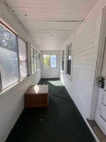 a room with furniture and window