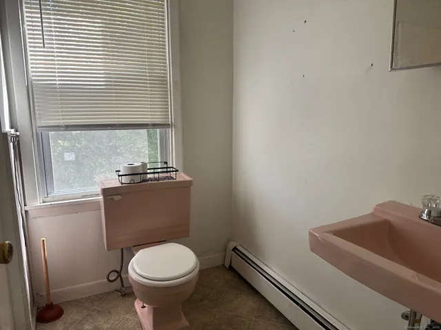a bathroom with a toilet