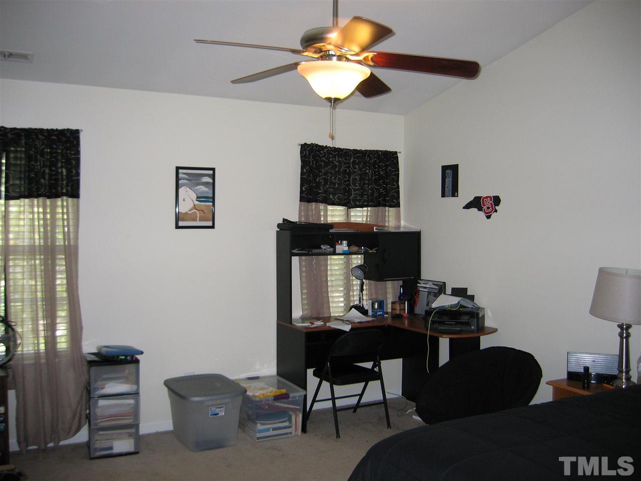 2840 Barrymore Street, Unit 105 Raleigh, NC 27603 - Photo 6 of 9 a view of a workspace with a window