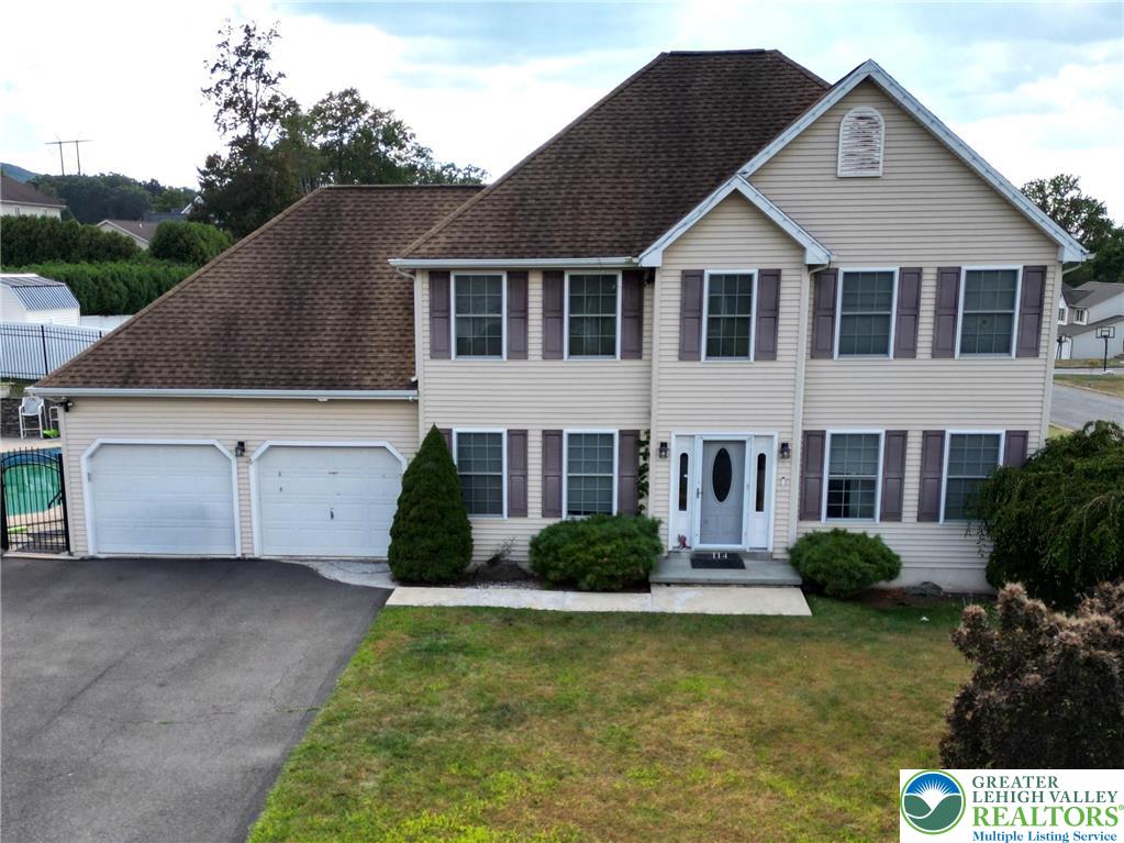 114 Kestrel Road Mountain Top, PA 18707 - Photo 1 of 45 a front view of a house with garden