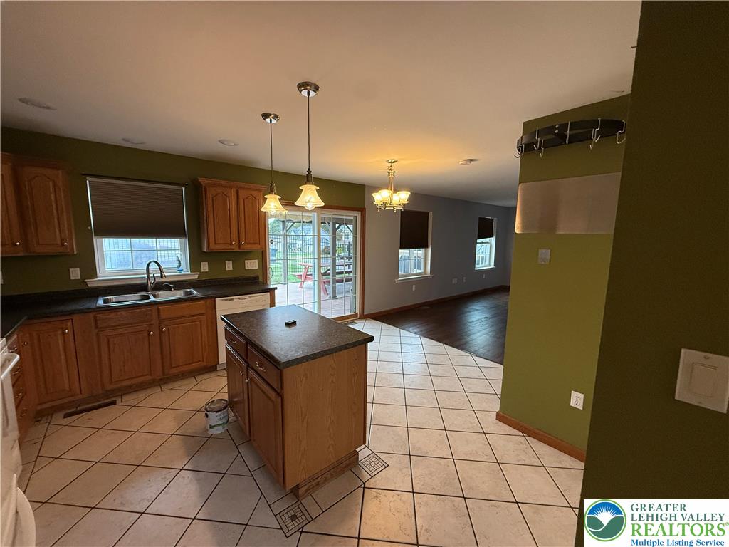114 Kestrel Road Mountain Top, PA 18707 - Photo 15 of 45 a kitchen with a sink a counter top space and cabinets