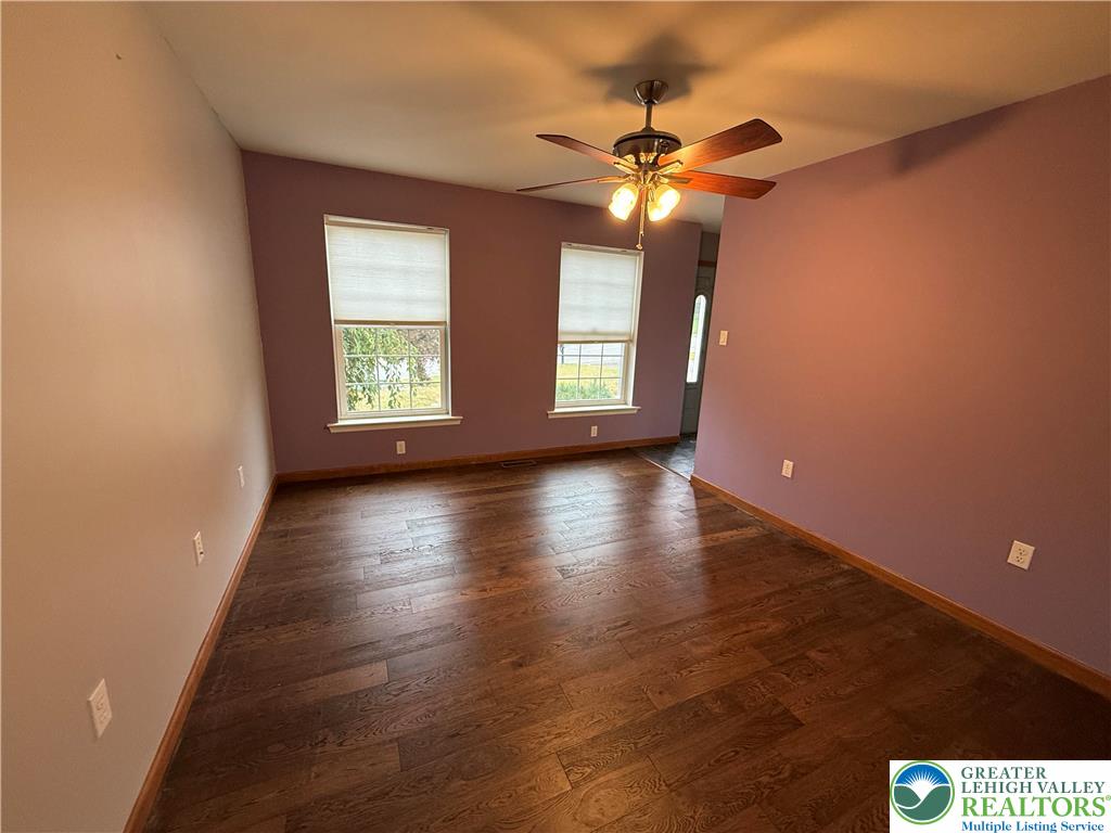 114 Kestrel Road Mountain Top, PA 18707 - Photo 18 of 45 a view of an empty room with wooden floor and a window