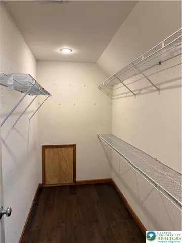 a view of a room with racks on the wall