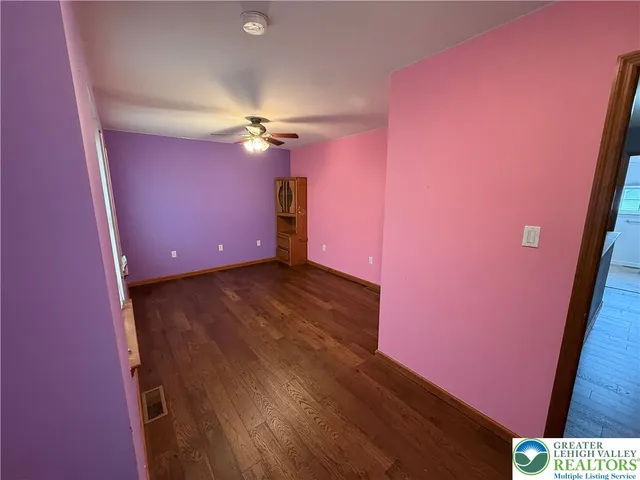 a view of a livingroom with a kitchen