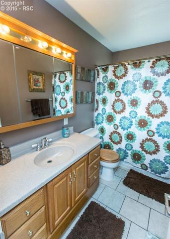 2007 North Chelton Road Colorado Springs, CO 80909 - Photo 16 of 35 The upstairs bathroom is a full bathroom. It is very roomy and has lots of counter and cabinet space.