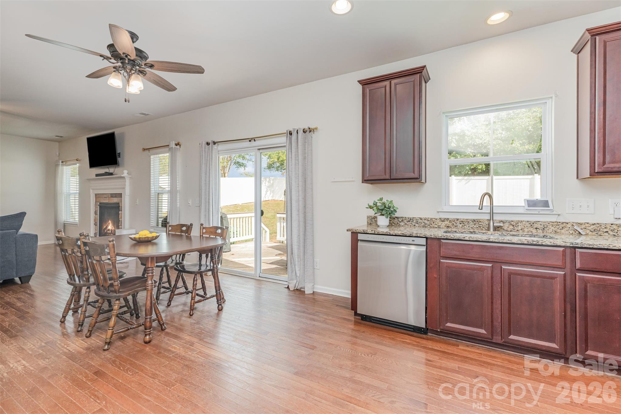353 Chorus Road Fort Mill, SC 29715 - Photo 11 of 30 a view of a dining room with furniture window and wooden floor