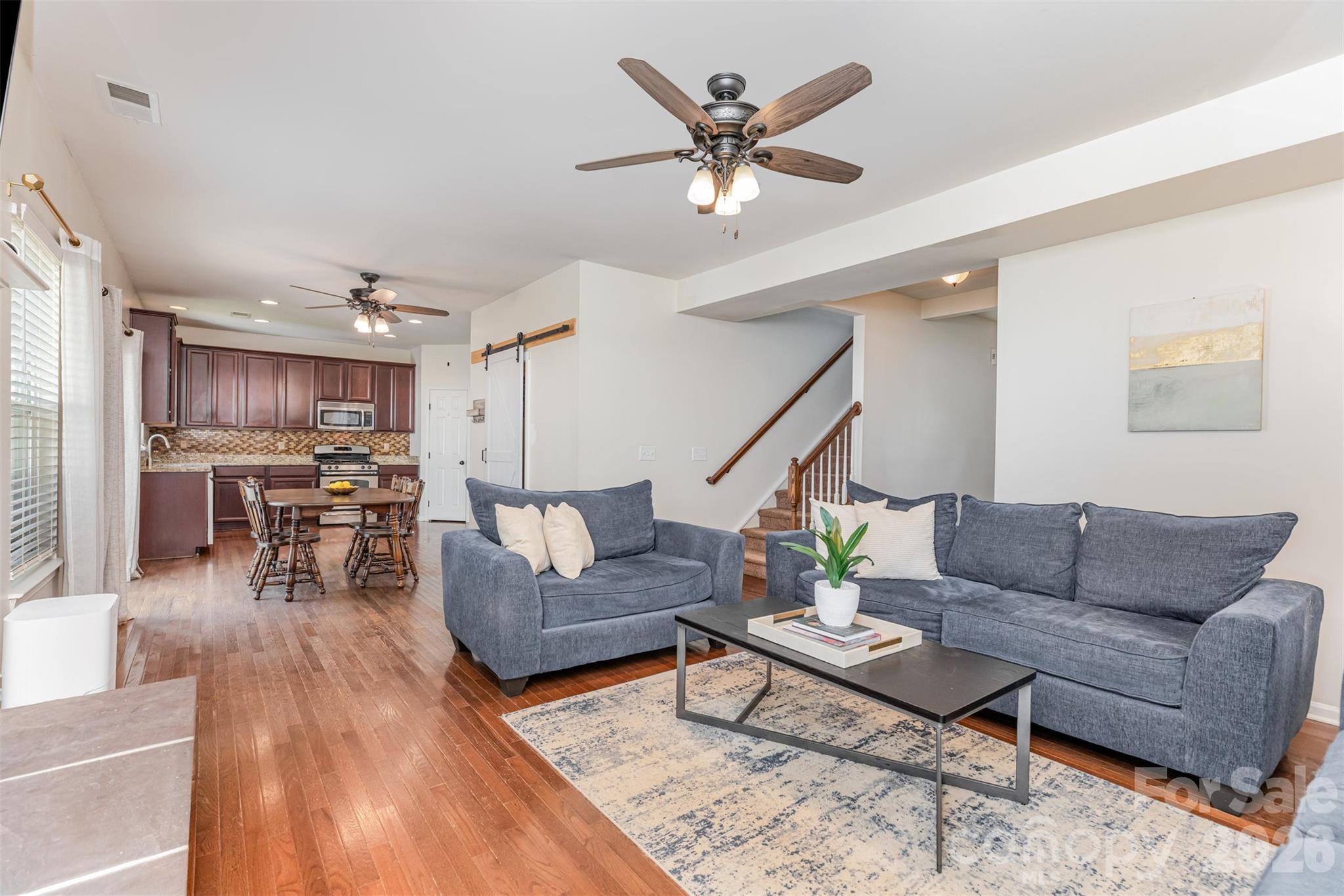353 Chorus Road Fort Mill, SC 29715 - Photo 14 of 30 a living room with furniture and kitchen view