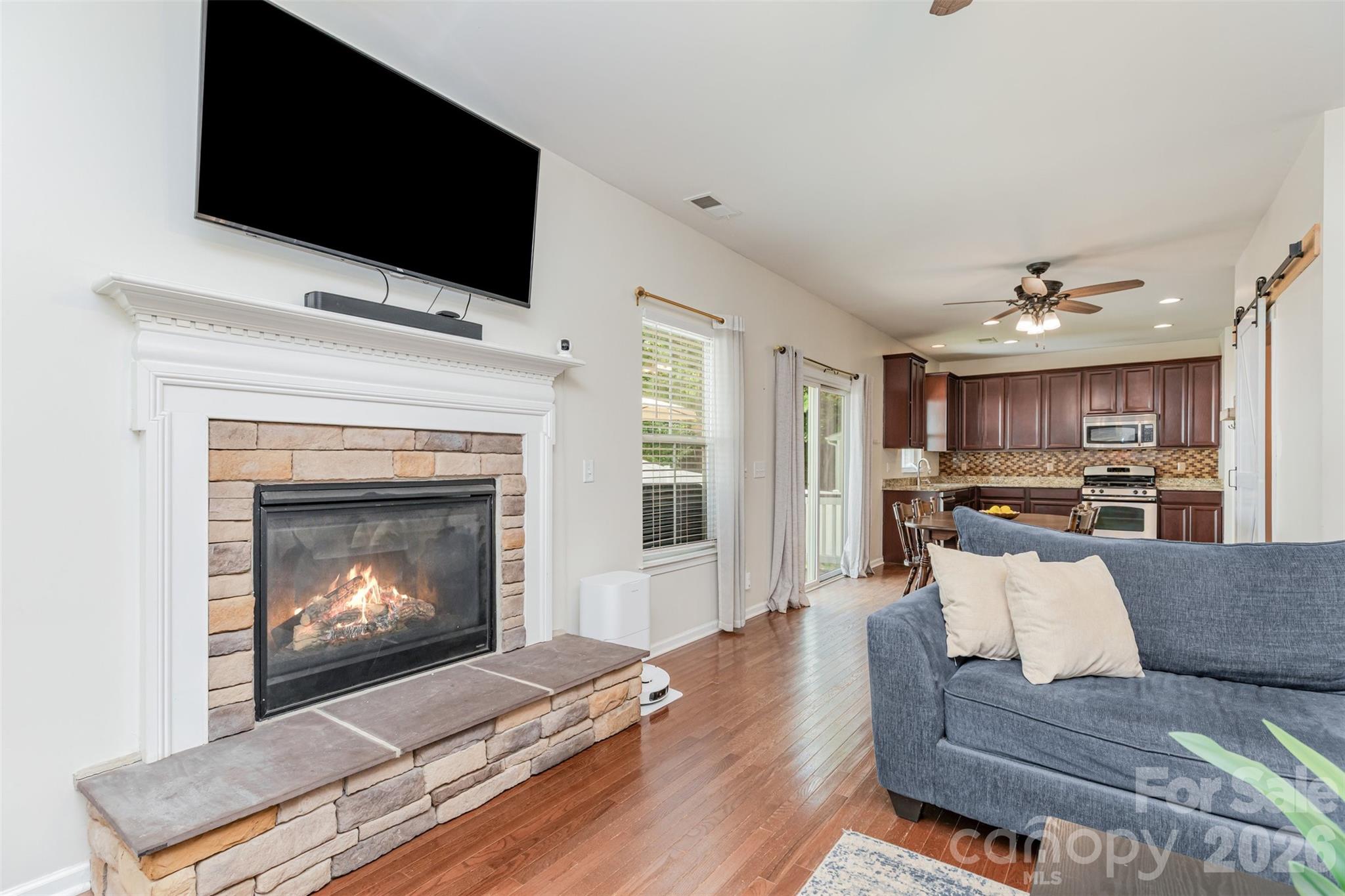 353 Chorus Road Fort Mill, SC 29715 - Photo 15 of 30 a living room with furniture and a fireplace