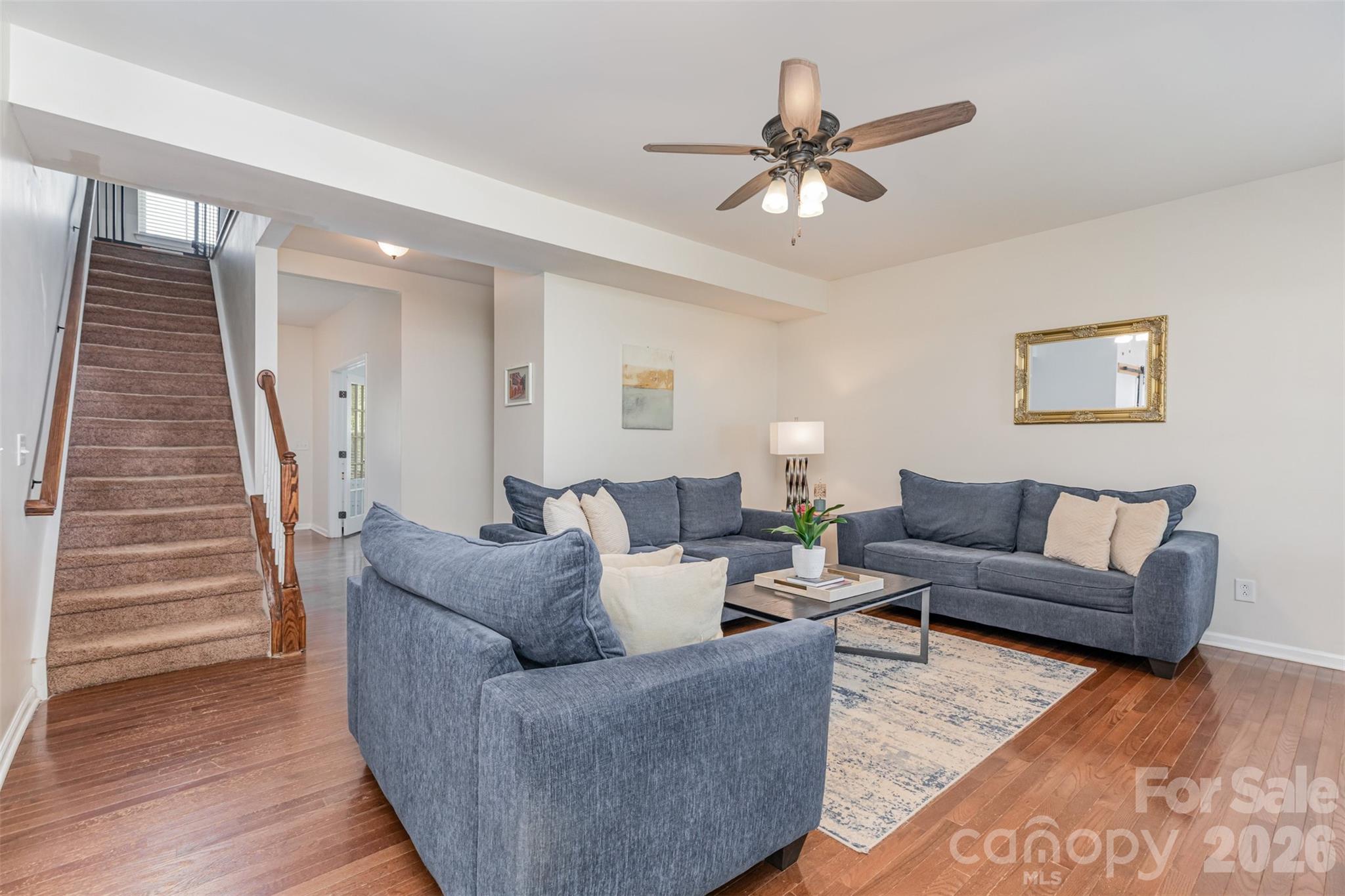 353 Chorus Road Fort Mill, SC 29715 - Photo 16 of 30 a living room with furniture and a wooden floor